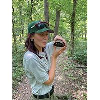 Holly Butcher holding a turtle